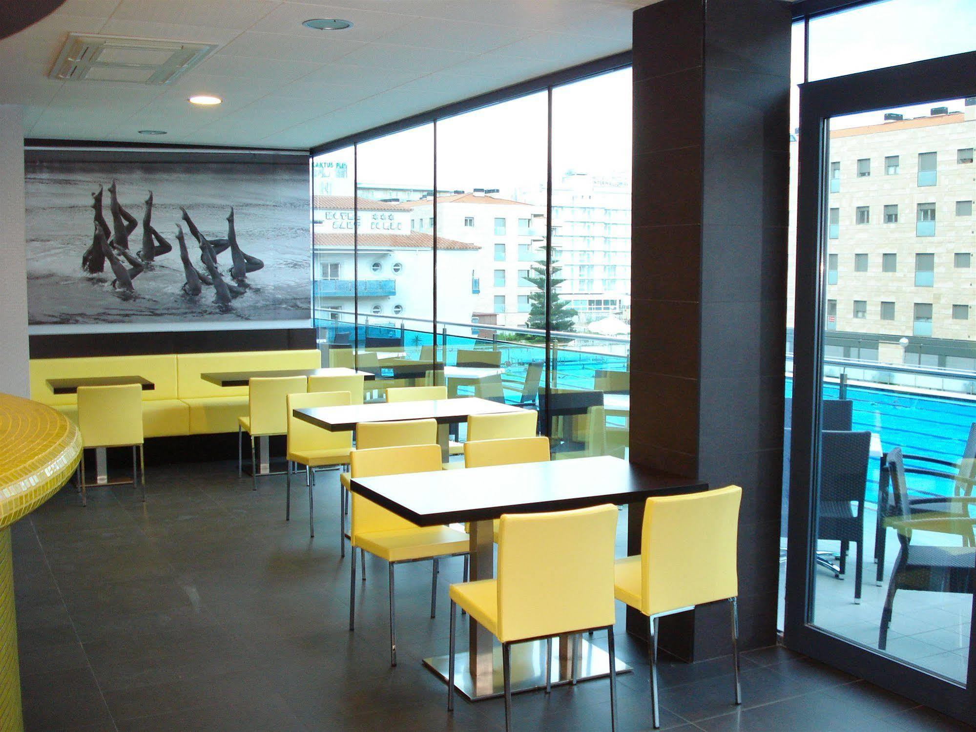 Sant Jordi Boutique Hotel 칼레라 외부 사진 Interior of a McDonald's restaurant in Prague, Czech Republic